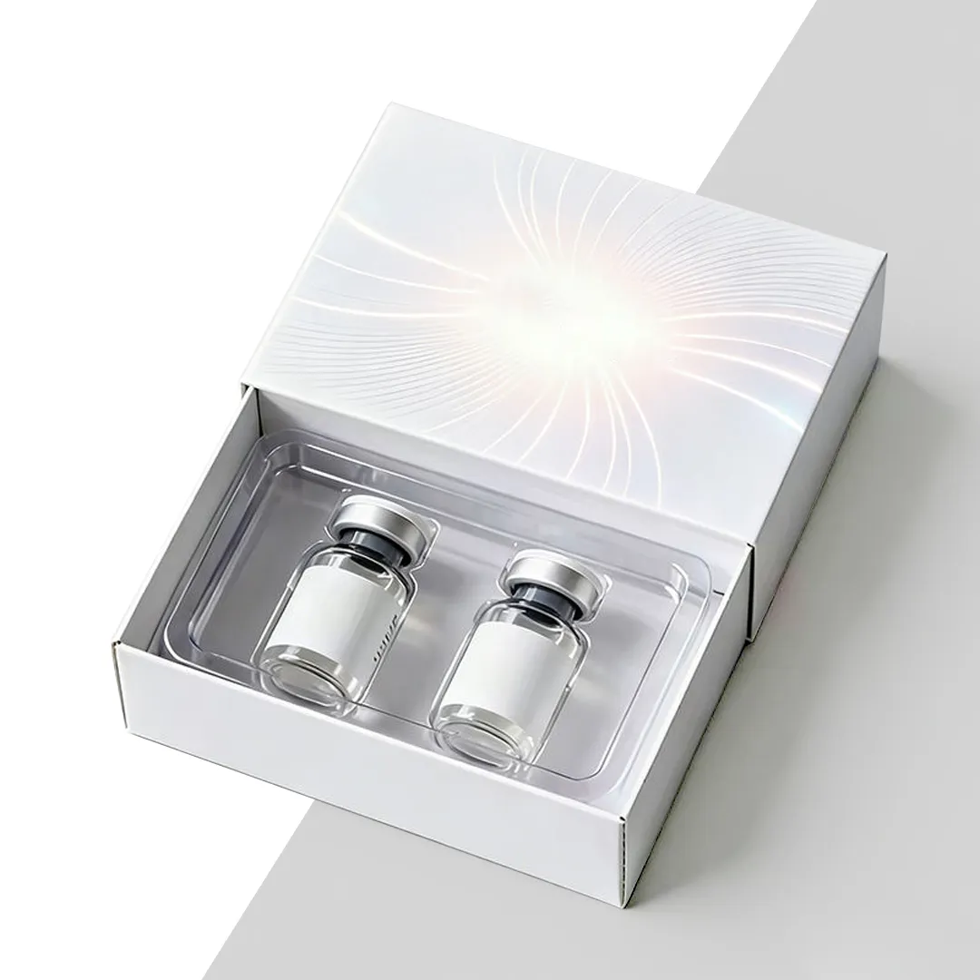 White two-vial kit box with a clear moulded tray holding two crimp-sealed vials