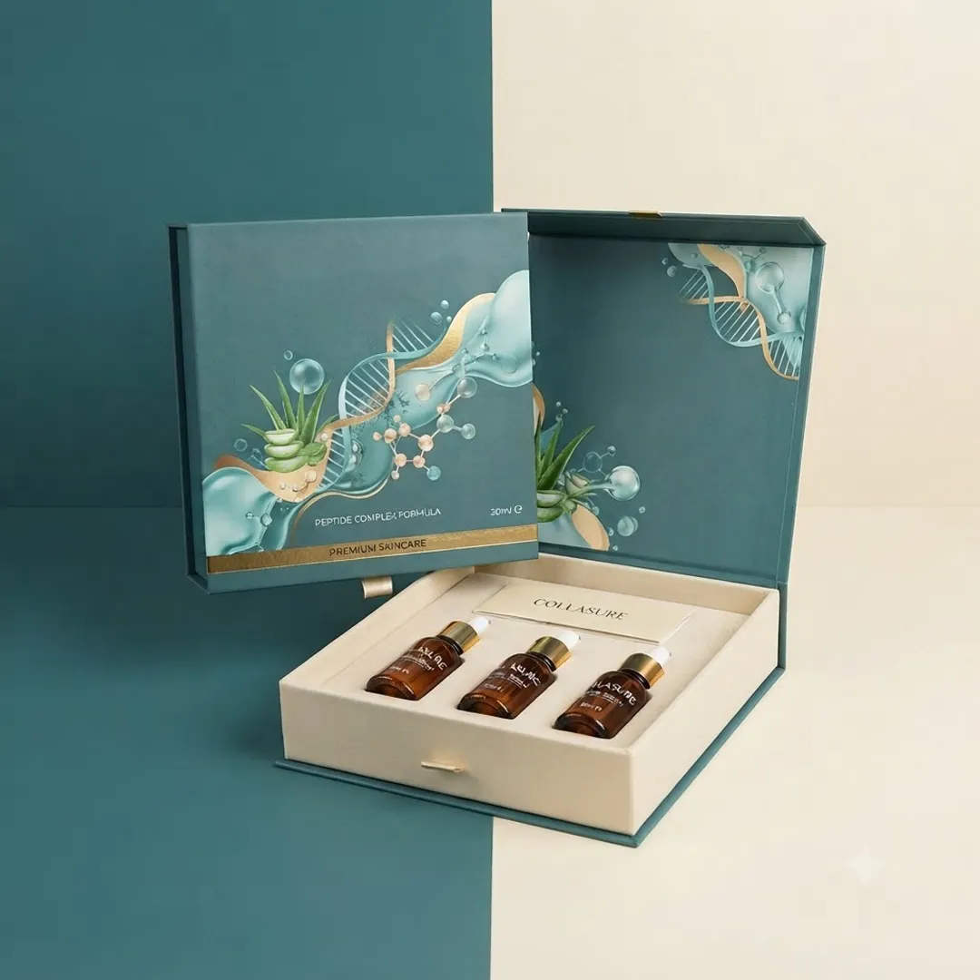 Teal and cream flip top box with a printed inner lid, holding three amber dropper vials in cavities